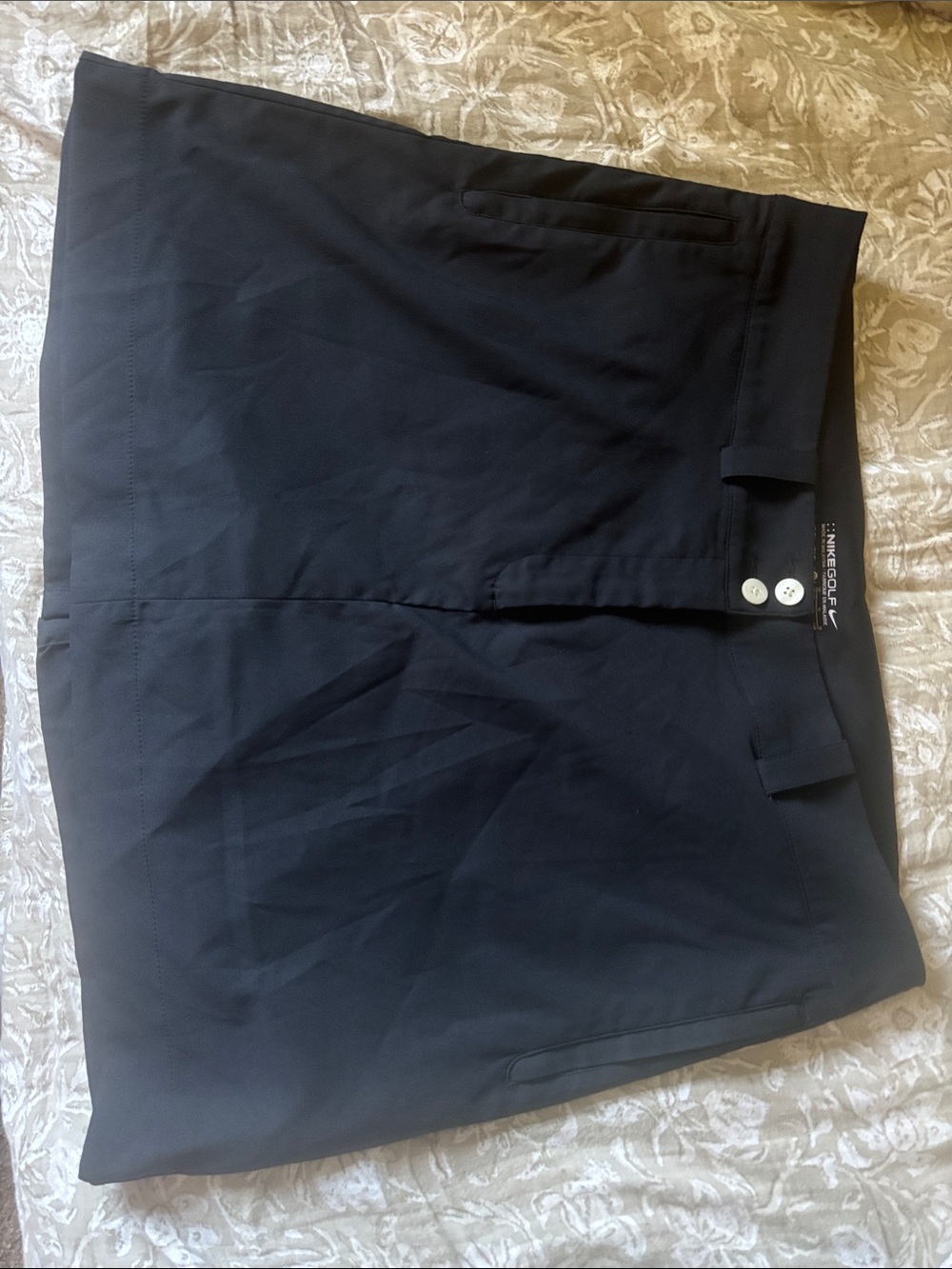 Nike Women's Black Golf Skort with Subtle Side Pocket Detail